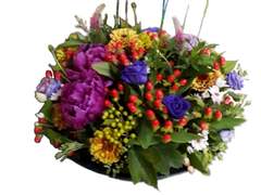 a group of flowers designed into a container