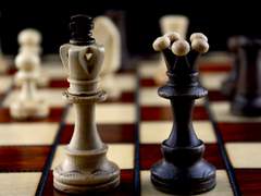 Whose seat is next to her?